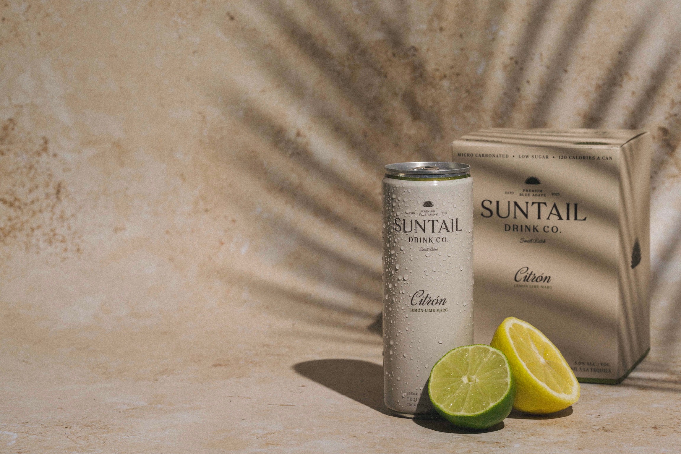 Citrón can and pack on travertine